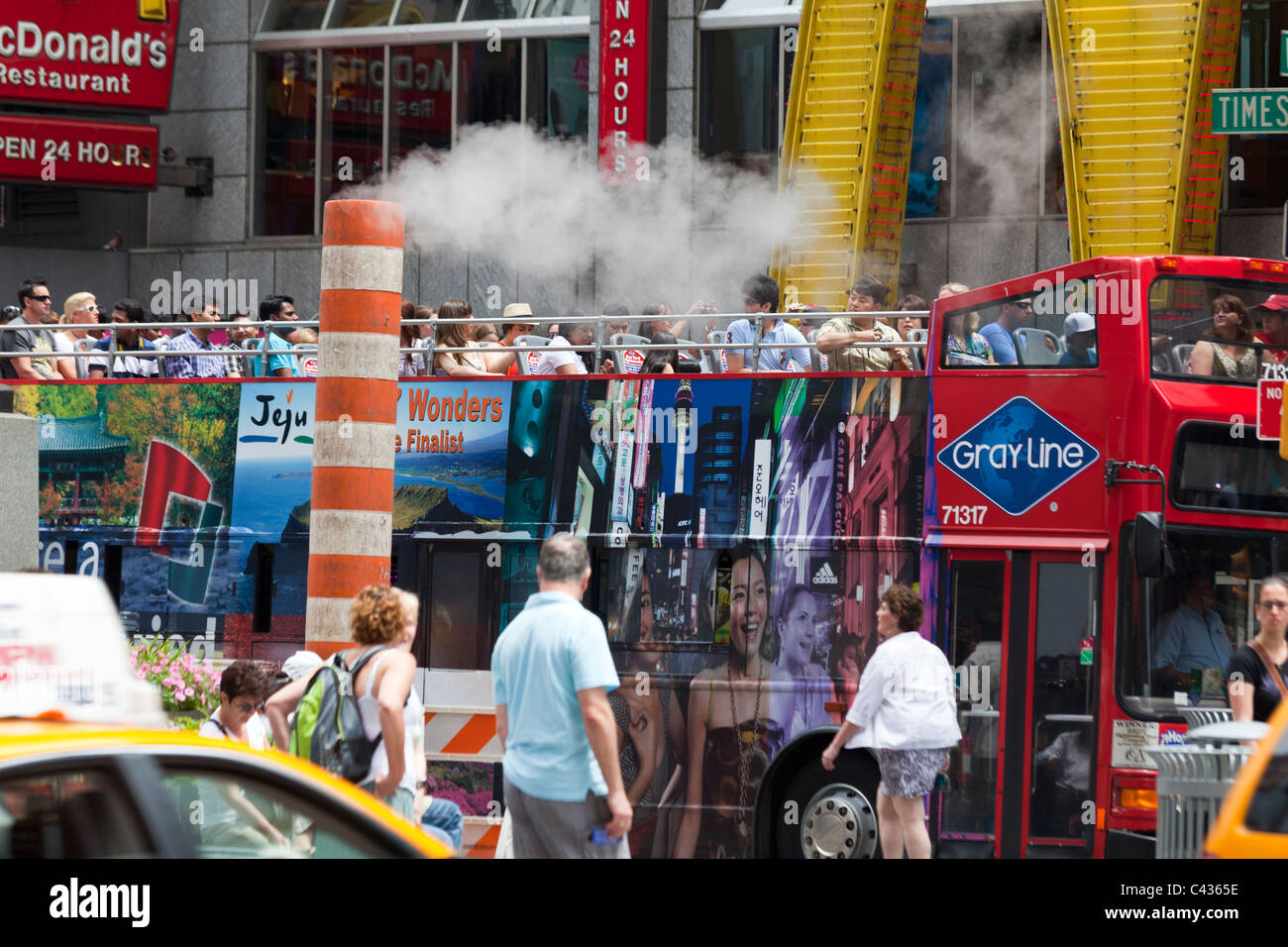 sightseeing bus in Times Square, New York City, USA Stock Photo