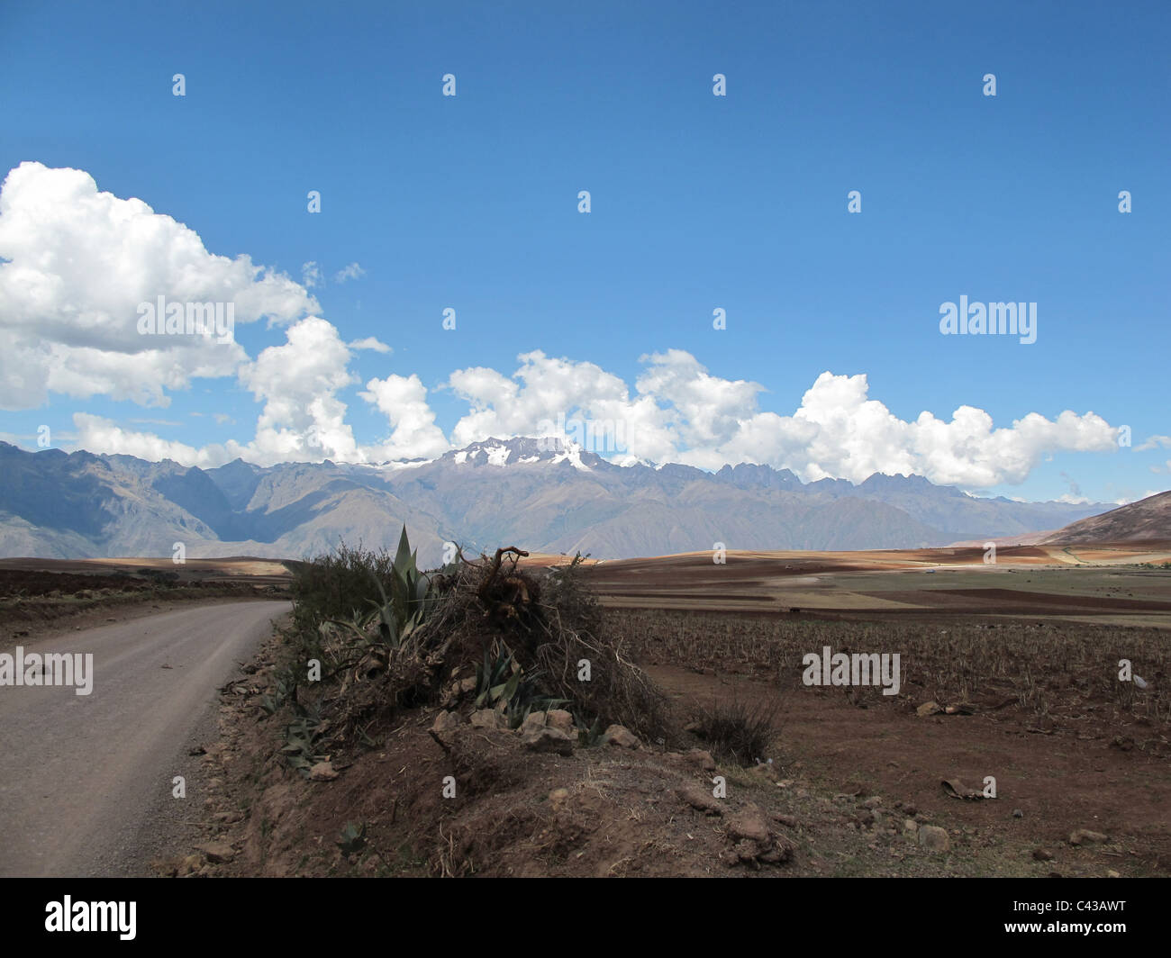 Road to village chinchero with farm fields both sides, Peru Stock Photo