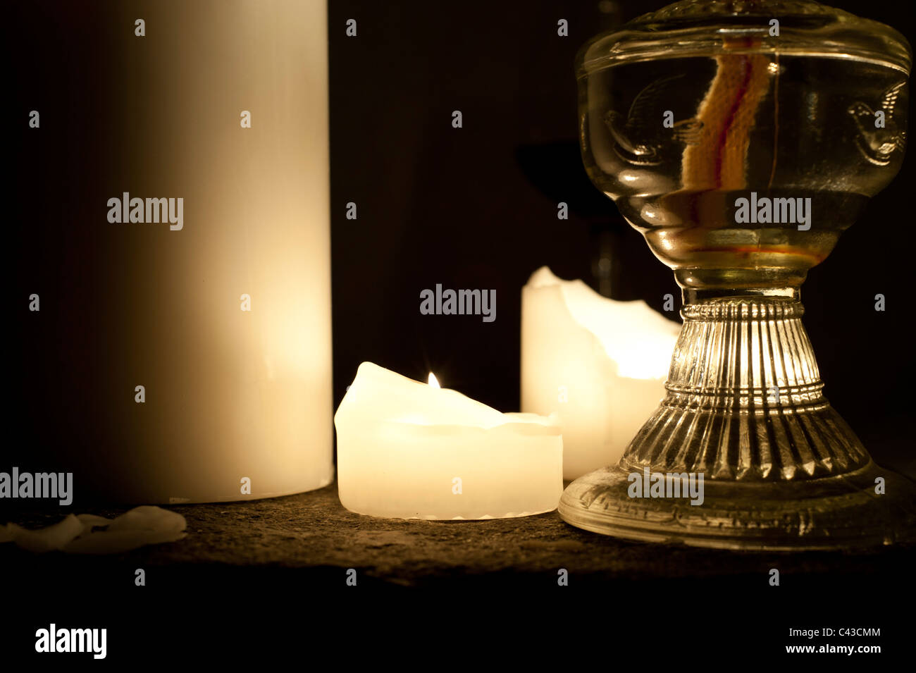 Candles and oil lamp Stock Photo Alamy