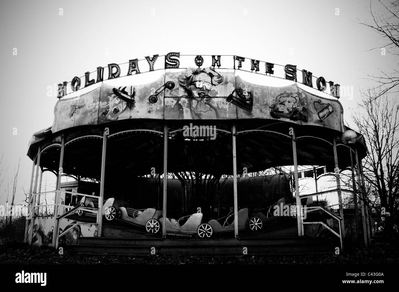 Abandoned carousel in abandoned amusement park Stock Photo