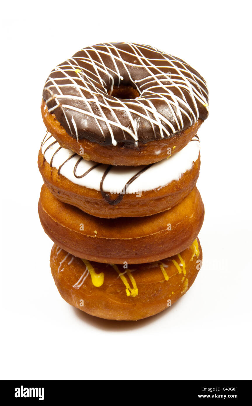 Pile of donuts in white background Stock Photo - Alamy