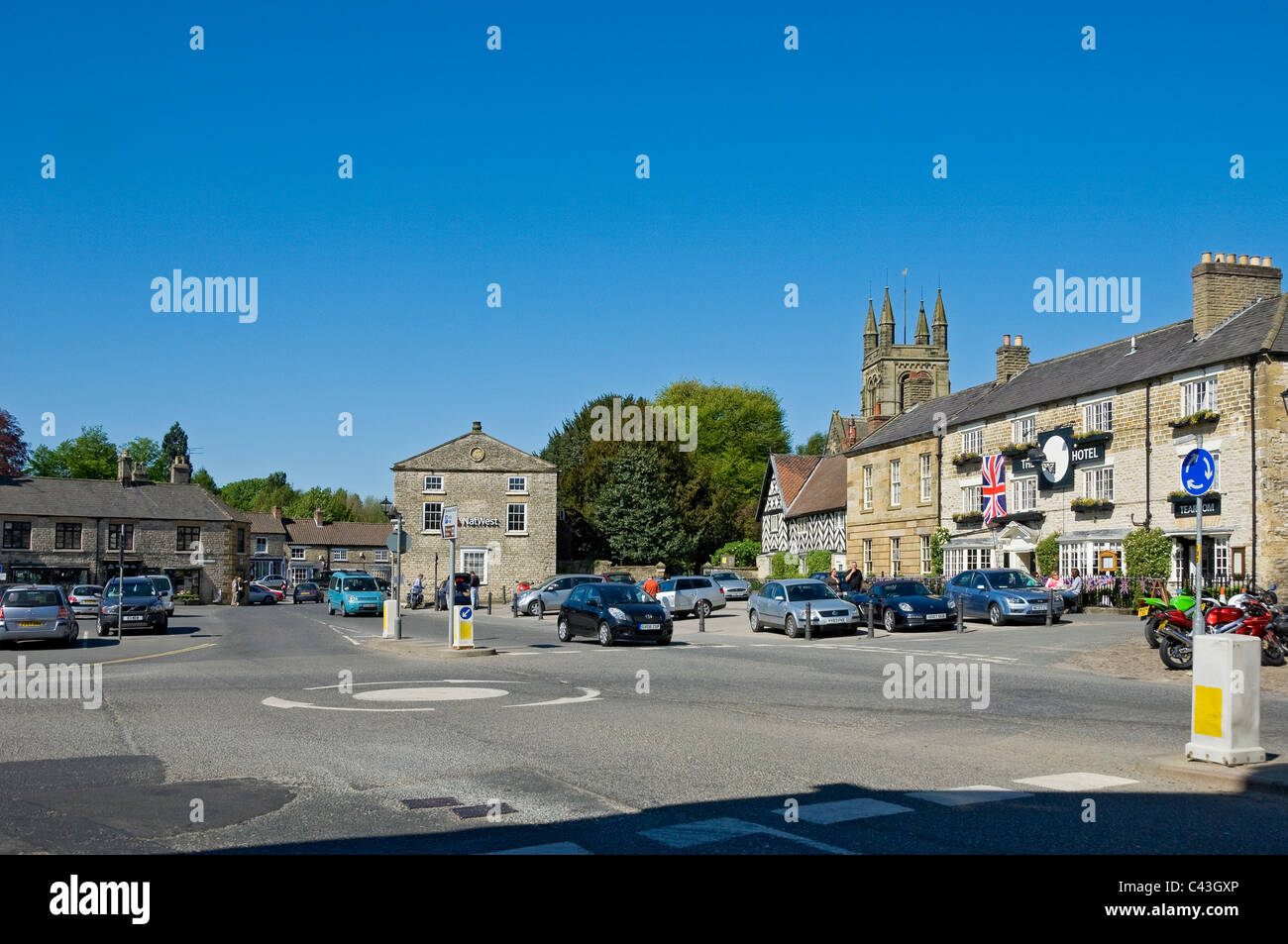 The Black Swan Hotel and Market Place square in spring Helmsley North Yorkshire England UK United Kingdom GB Great Britain Stock Photo