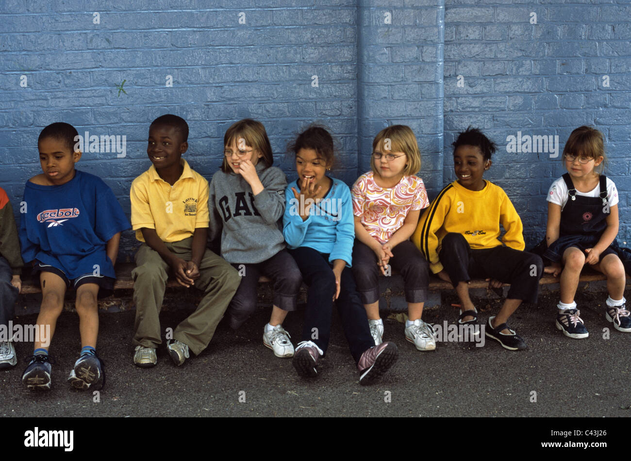 group of children standing in school playground Stock Photo - Alamy