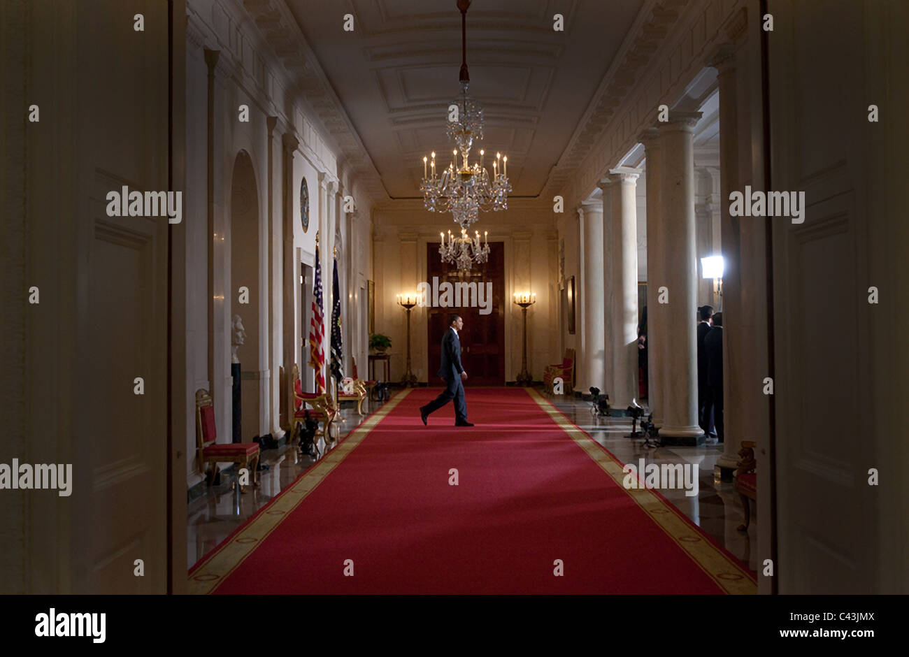 President Barack Obama walks to a podium in the Cross Hall, Grand Foyer ...