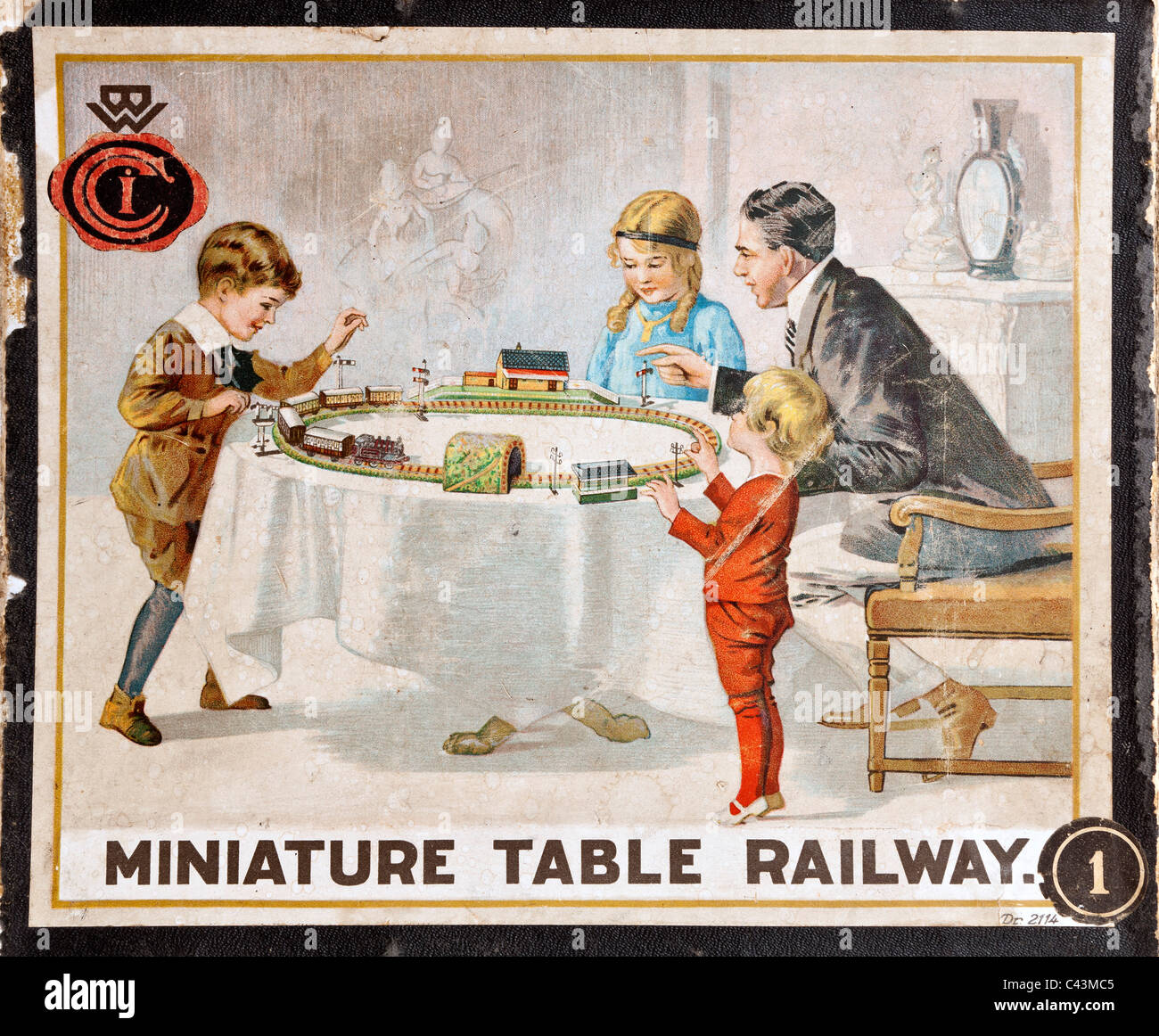 Box lid illustration from clockwork Bing Miniature Table Railway, world's first 00 gauge toy train set introduced 1922. JMH4940 Stock Photo