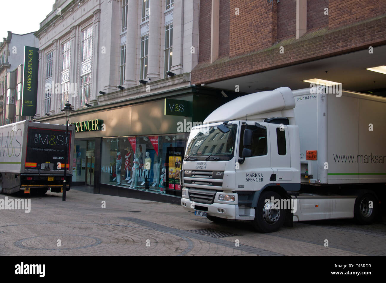 A delivery lorry in the early morning outside Marks and Spencer in Scarborough. Stock Photo