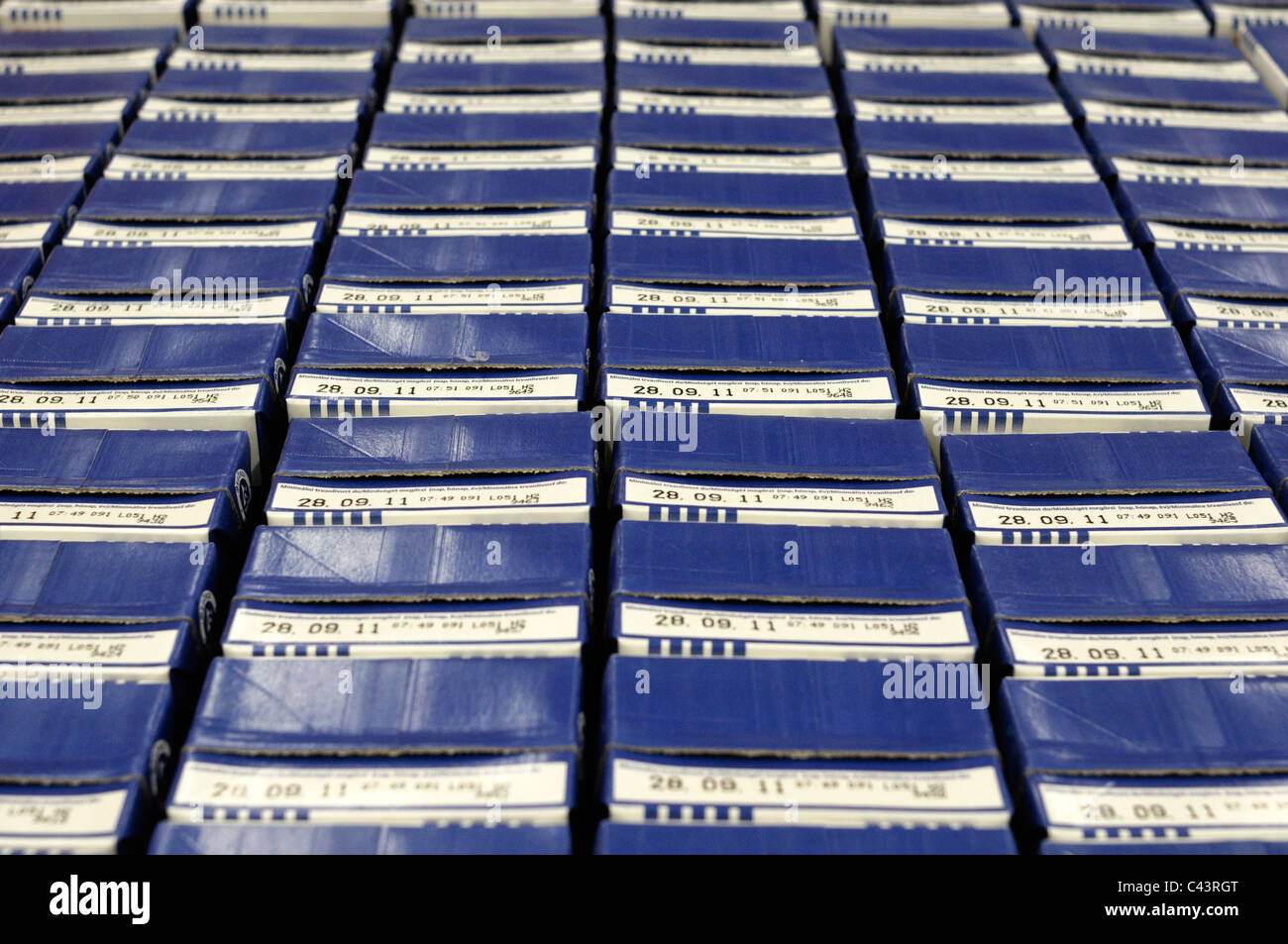 Rows of Tesco 'value' brand milk cartons. Stock Photo