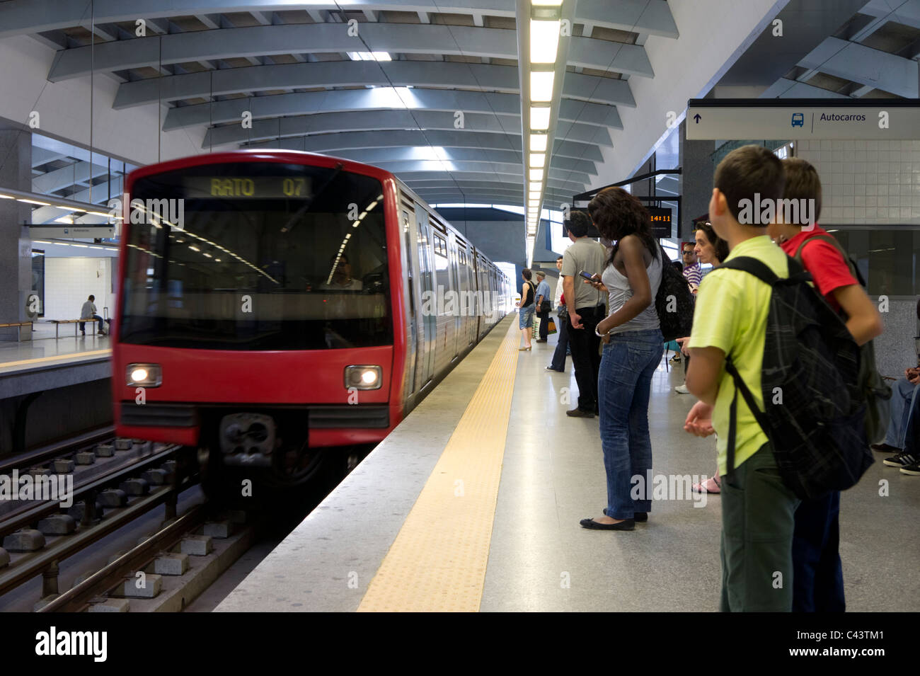Train arriving at underground tube station platform in Lisbon, Portugal Stock Photo