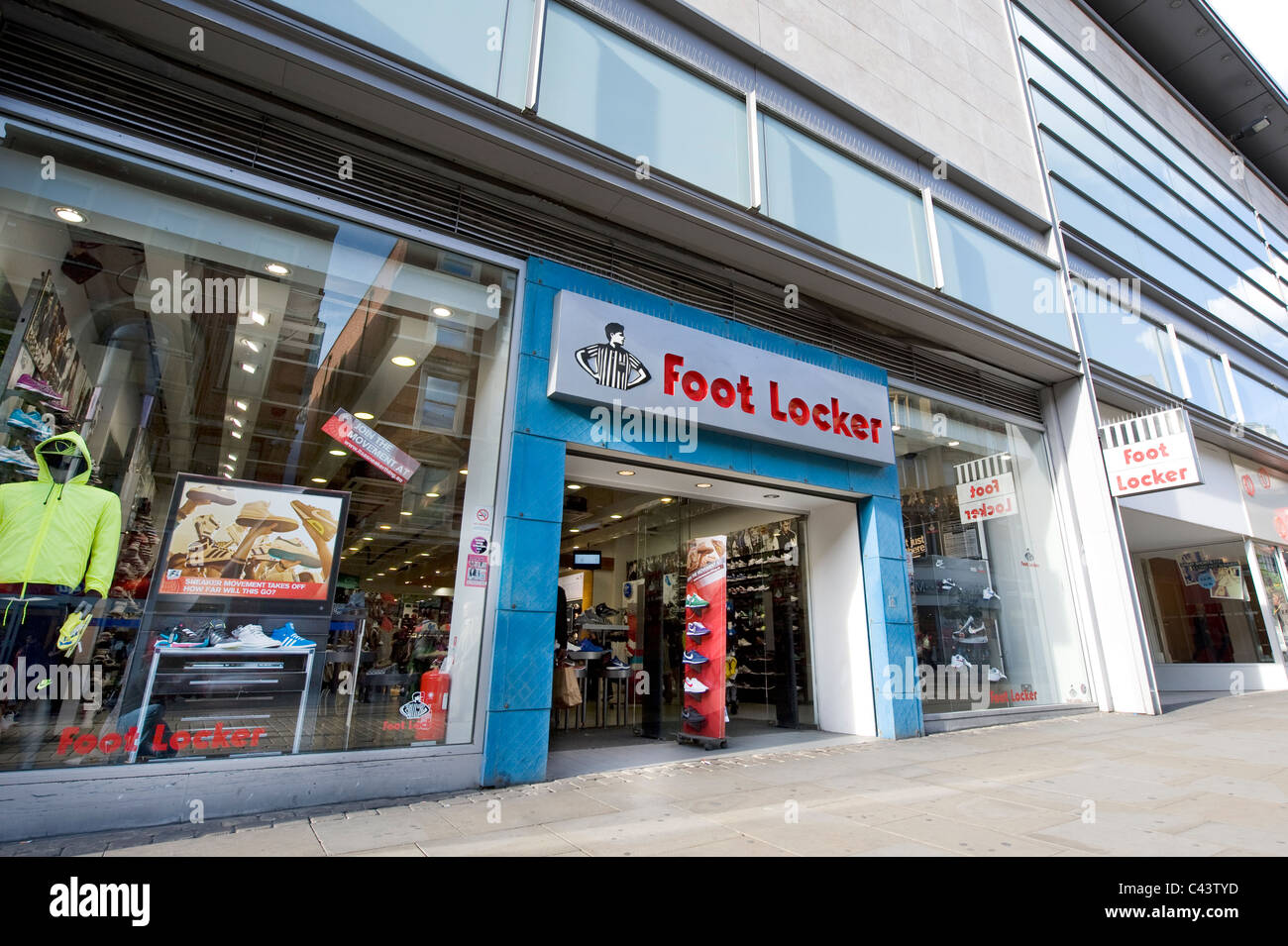 The storefront of the high street retailer Foot Locker on Market Street, Manchester. (Editorial use only). Stock Photo