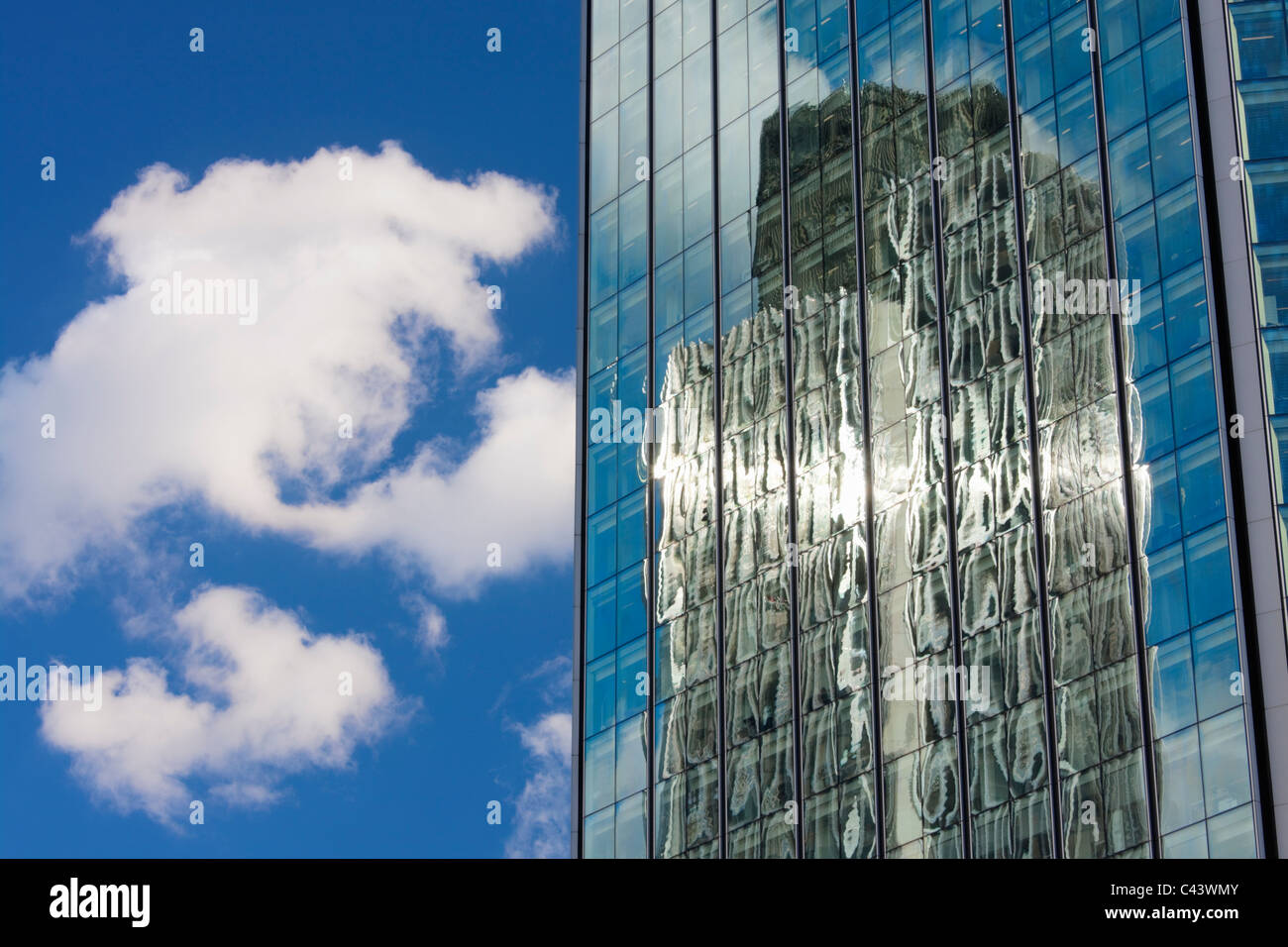 Reflection of Tower 42 in skyscraper; London; England Stock Photo