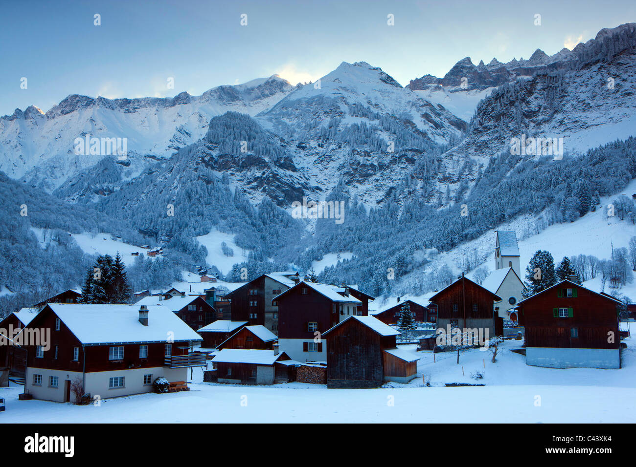 Elm, Switzerland, Europe, canton Glarus, village, houses, homes, church, winter, snow, mountains Stock Photo