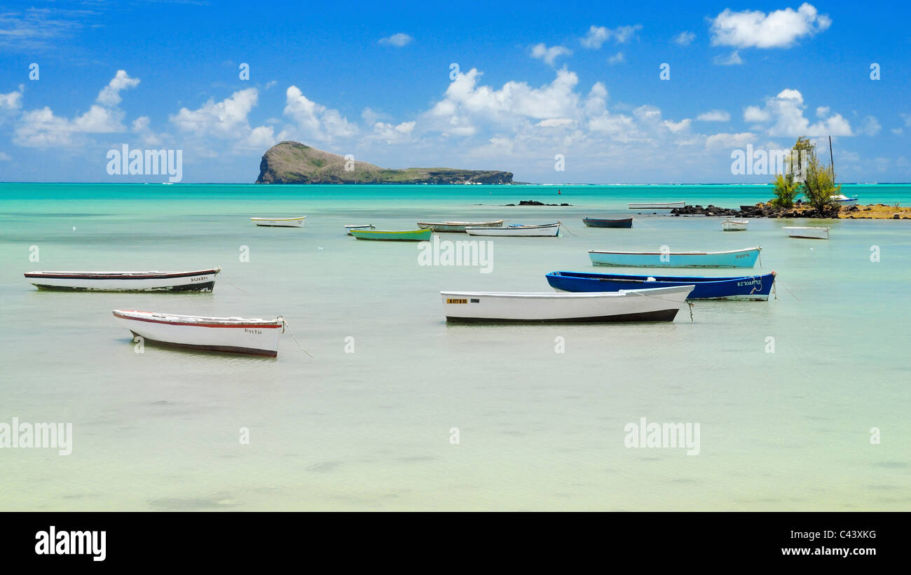 Boats at the public beach at the Butte à l'Herbe in Grand Gaube, Riviere Du Rempart, Mauritius. Stock Photo