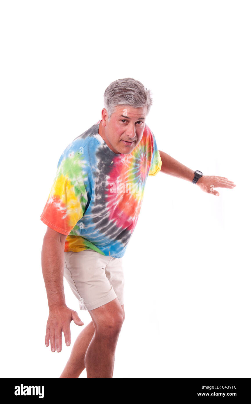 Studio shot, release, cut-out, background, white, man, portrait, dynamically, carelessly, T-shirt, brightly, batik, shorts, know Stock Photo