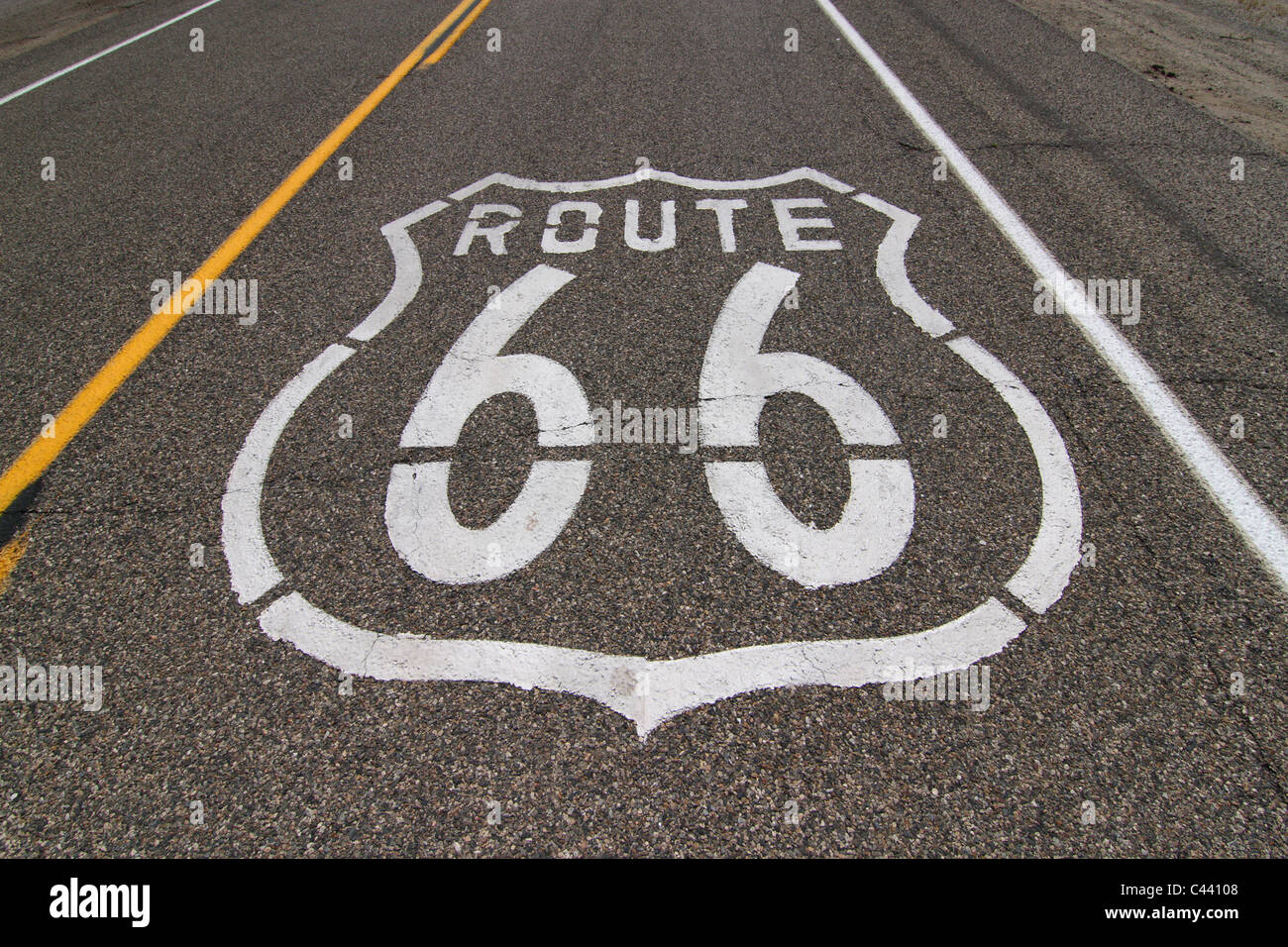 Historic route 66 sign painted on the highway in the southwestern united states of america Stock Photo