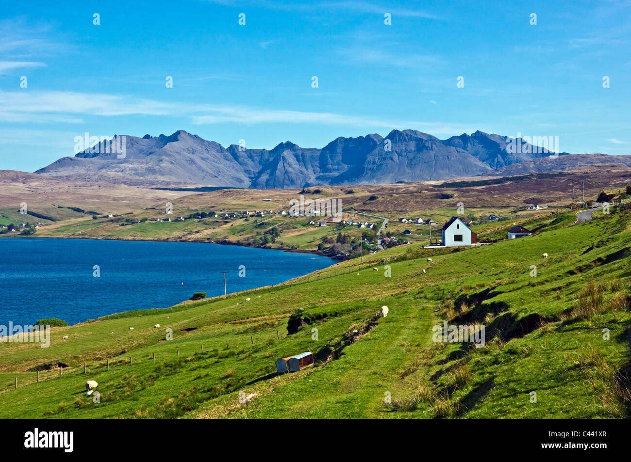 View from above Skye village Carbost towards the Cuillin Hills Stock Photo
