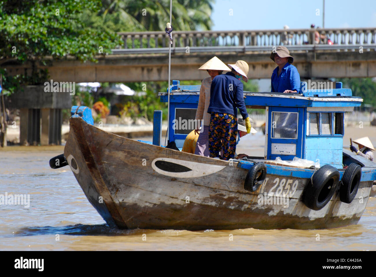 Vietnam Mekong Delta boat people working Stock Photo - Alamy