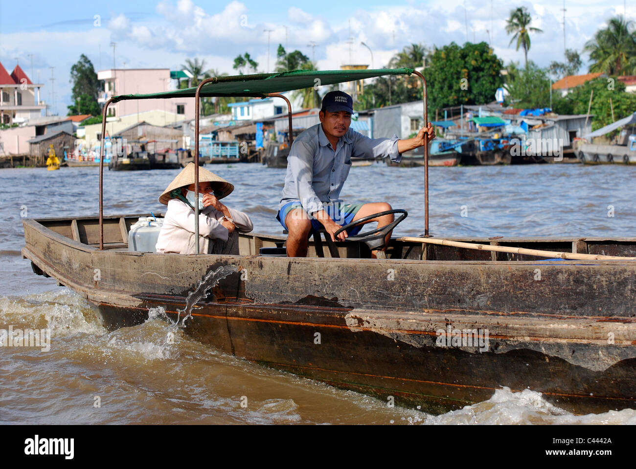 Vietnam Mekong Delta - boat people working Stock Photo - Alamy