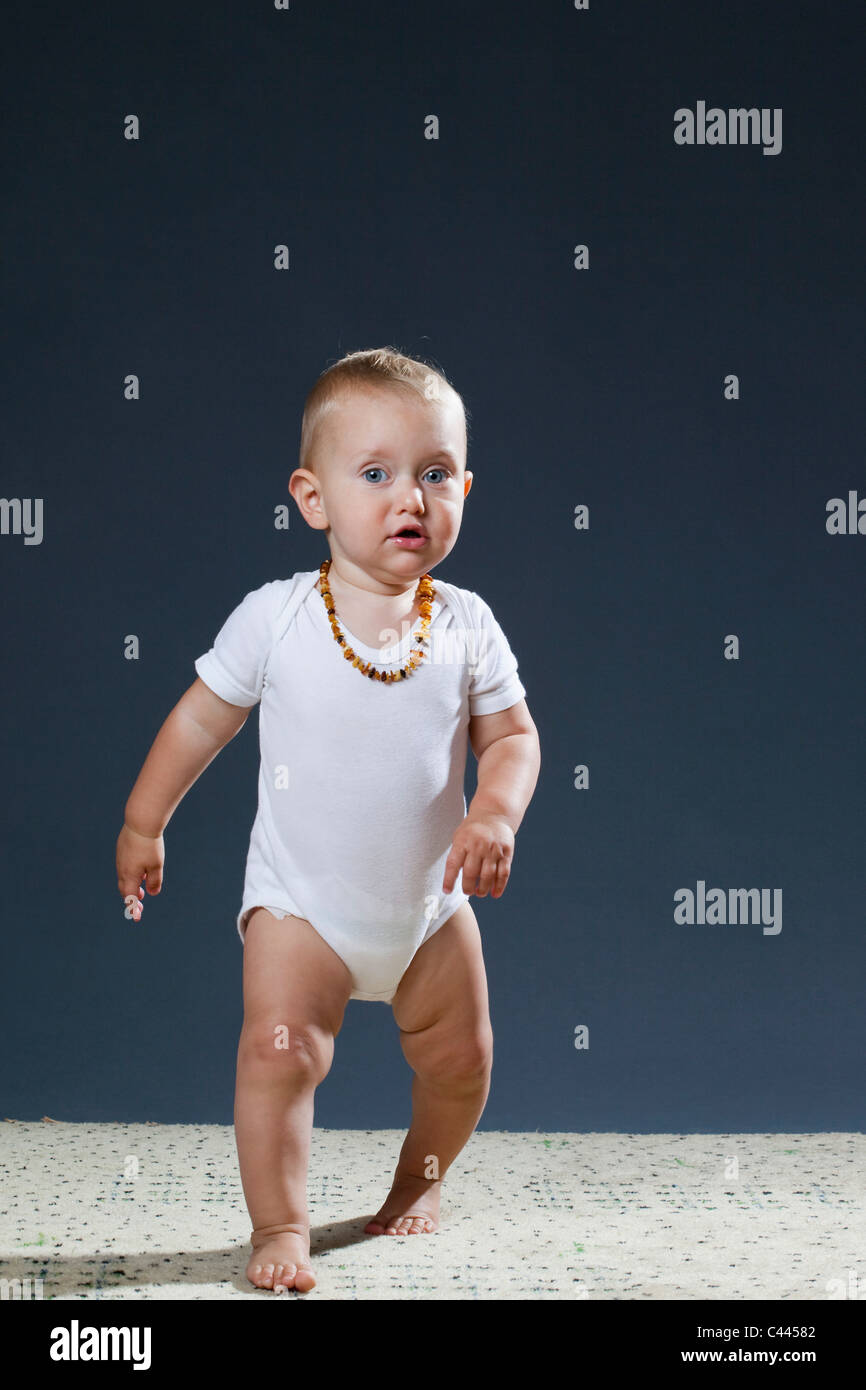 Portrait of a toddler walking Stock Photo Alamy