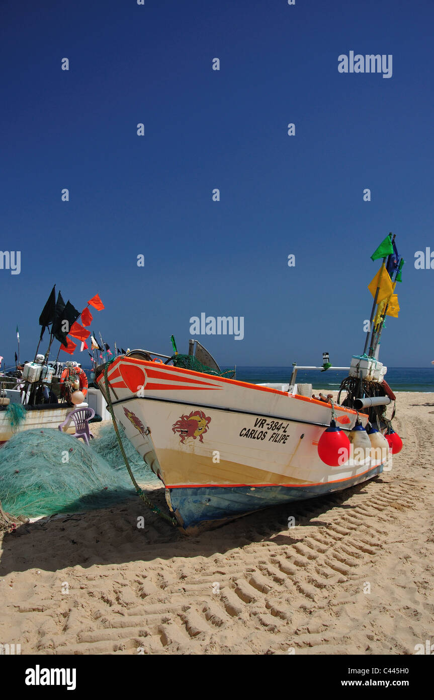 Fishing boat on beach, Monte Gordo, Vila Real de Santo António  Municipality, Faro District, Algarve Region, Portugal Stock Photo - Alamy