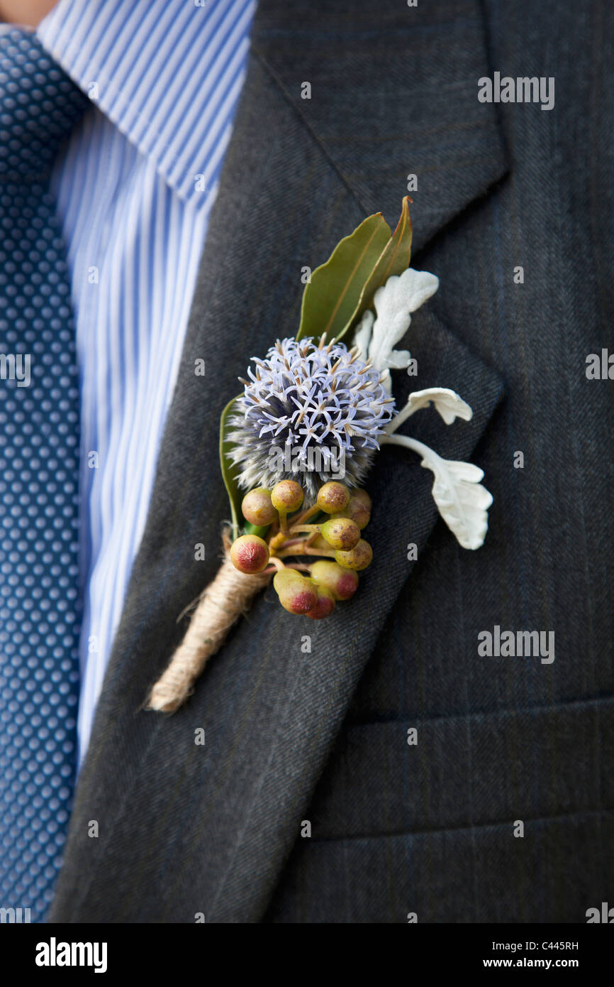 Detail of a corsage on the lapel of a man Stock Photo