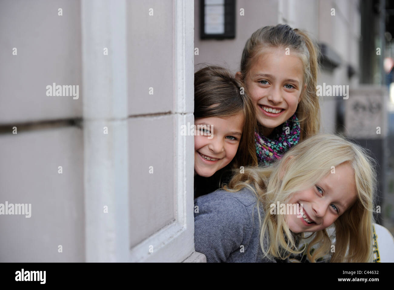 Children five to nine, playing in the city on a residential road in Duesseldorf, Germany. Stock Photo