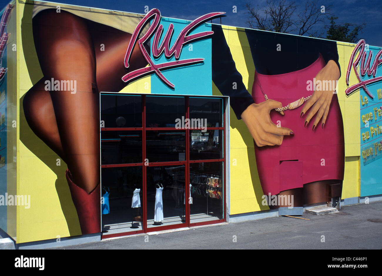 Women's Clothes Shop Front, Out of Town Clothes Store Painted with Woman's Legs & Mini Skirt, Mandelieu-la-Napoule, Alpes-Maritimes, France Stock Photo