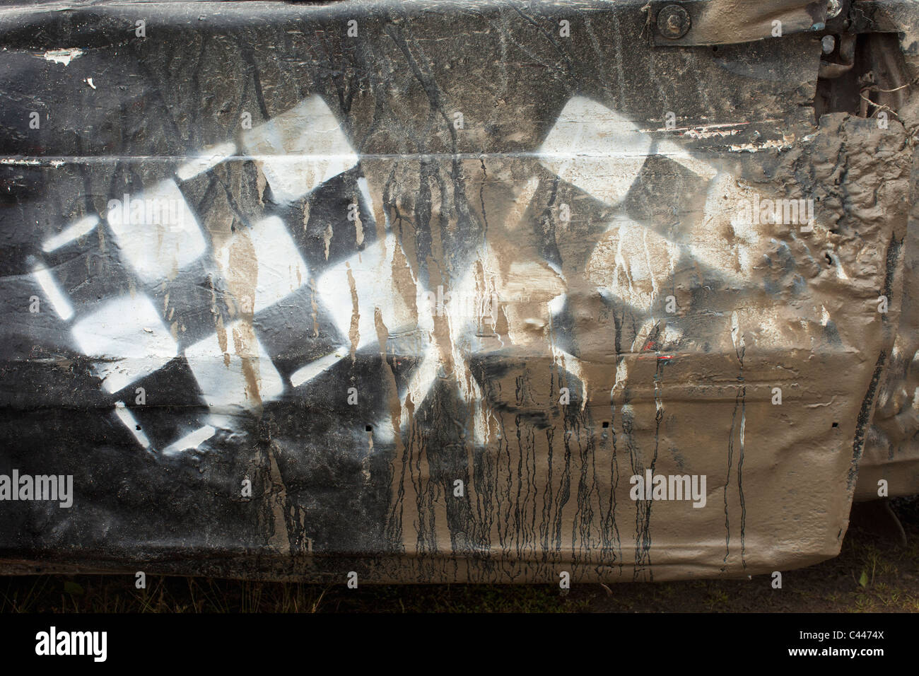 Checkered flags on sports car Stock Photo Alamy