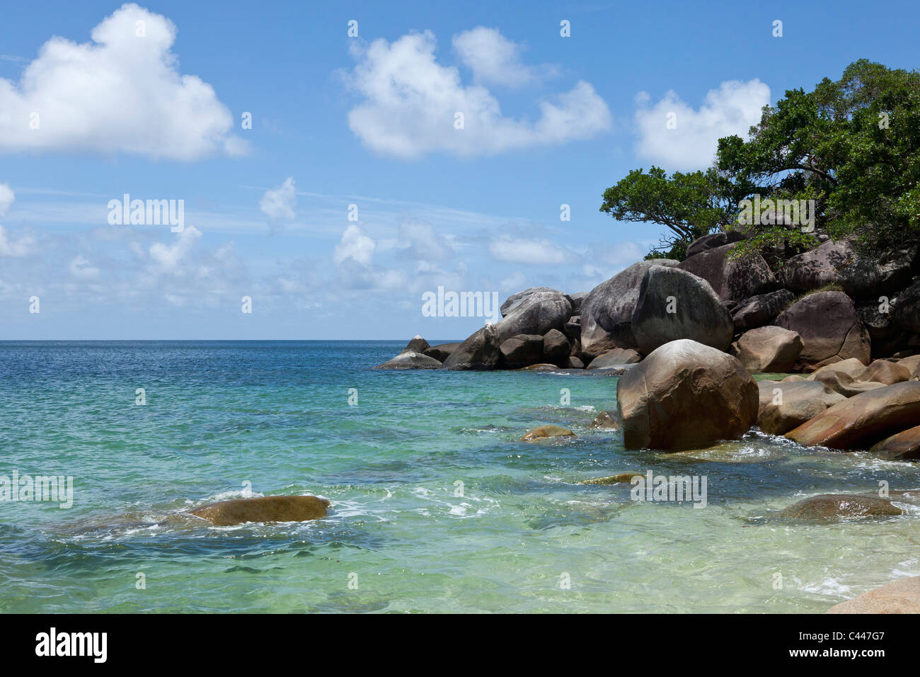 View of the sea and a rocky coastline Stock Photo