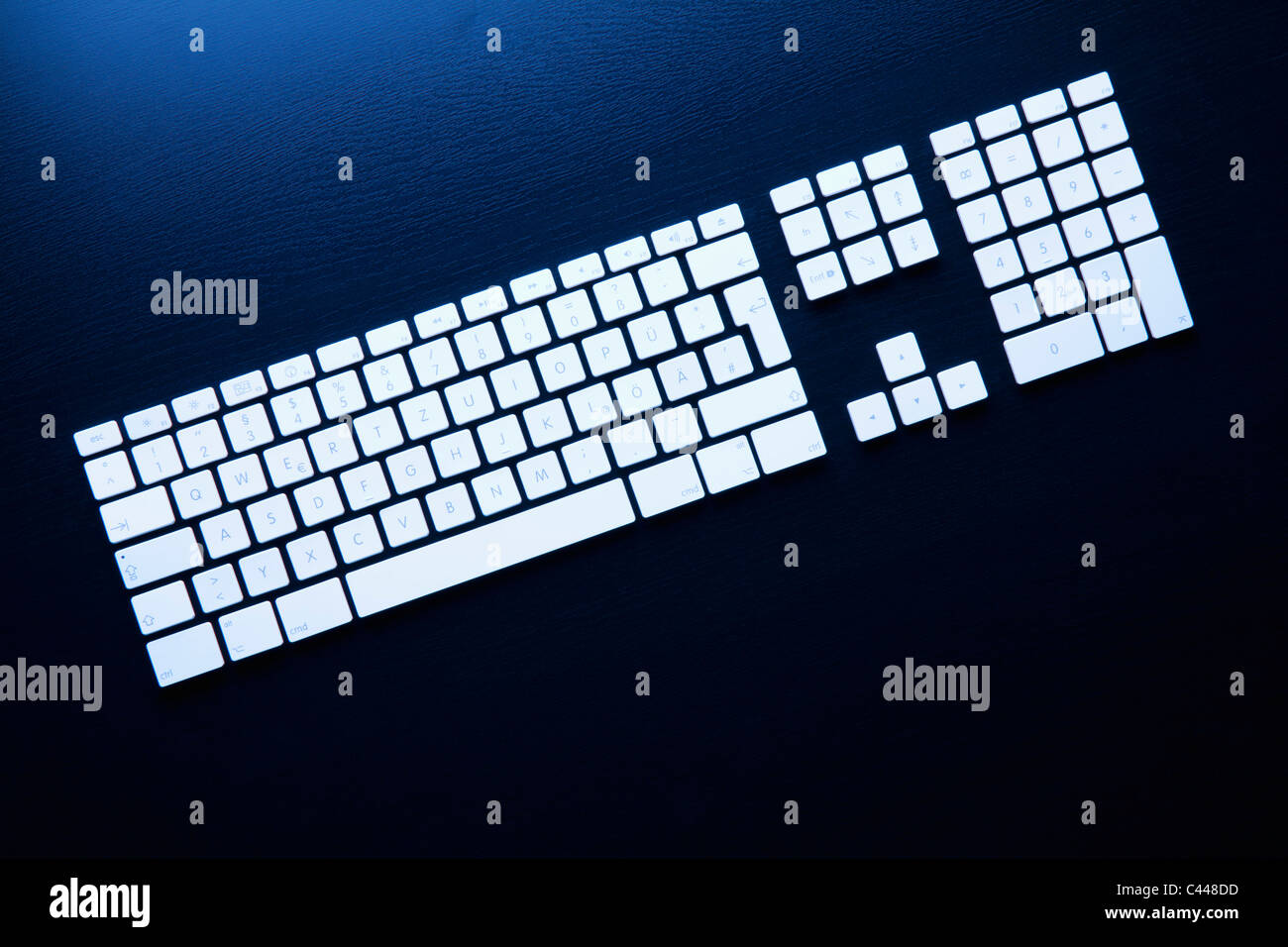 Separate computer keys arranged to look like an actual keyboard Stock