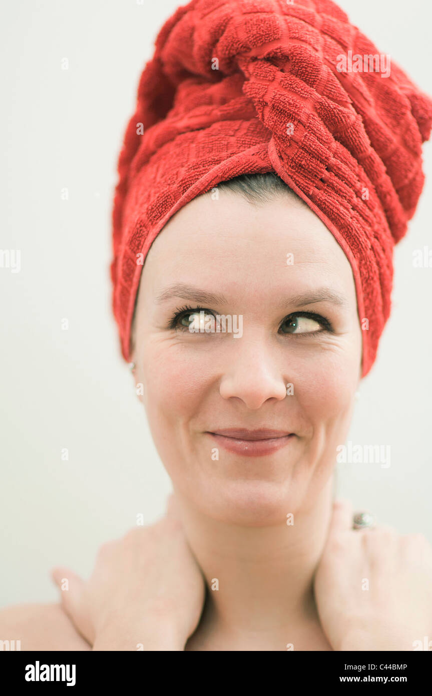 Woman in towel side glance Stock Photo