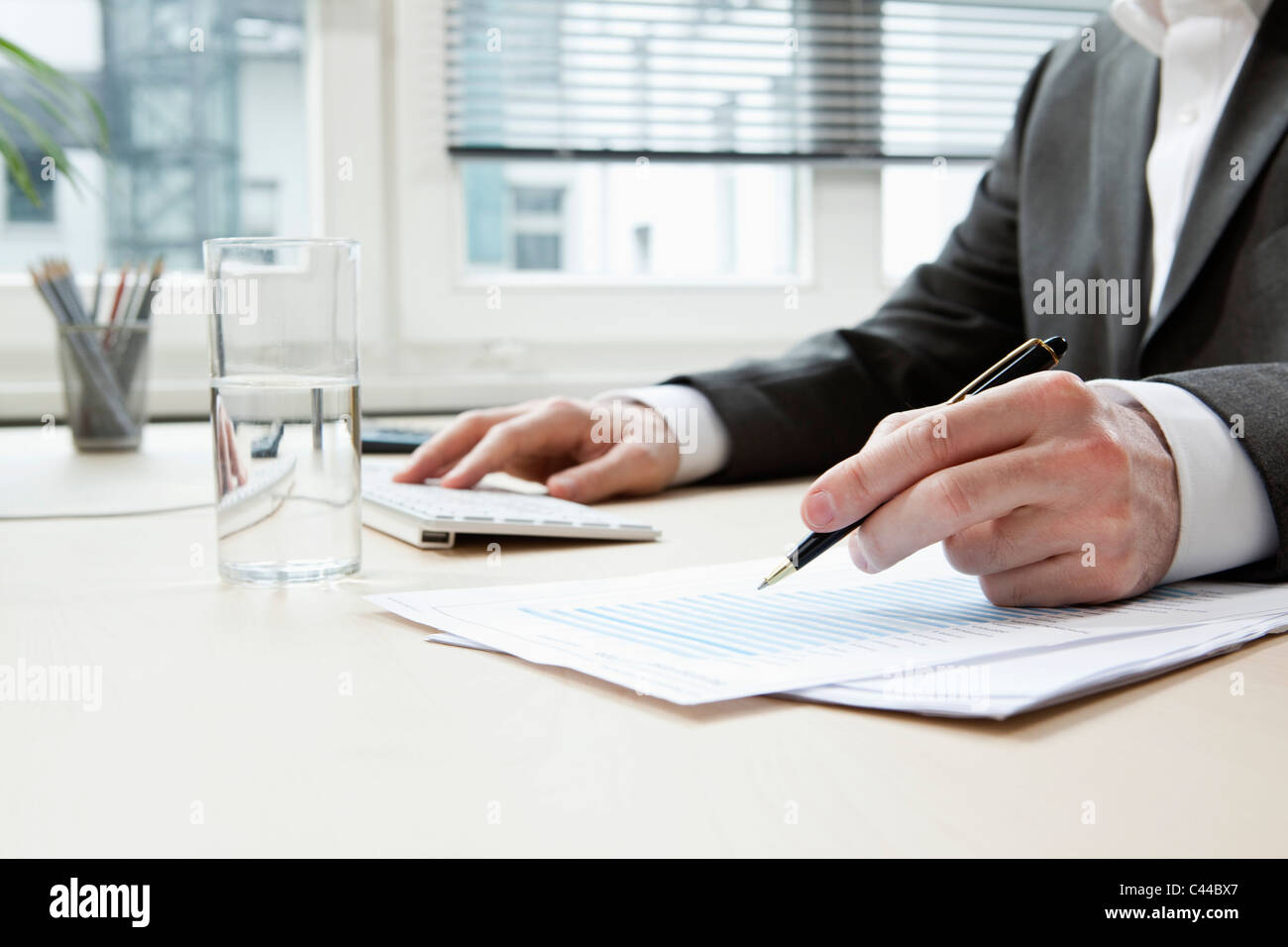 Businessman hands typing Stock Photo - Alamy