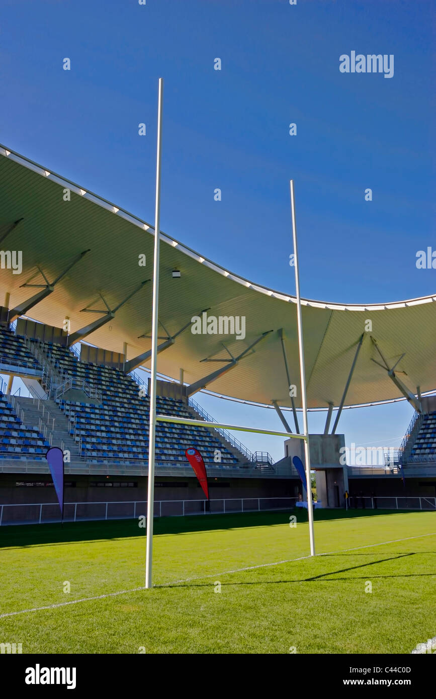 Empty rugby stadium with goal post Stock Photo