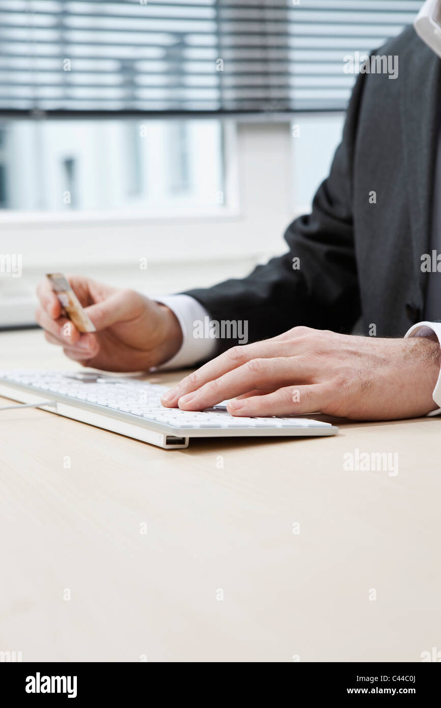 Businessman hands typing Stock Photo - Alamy