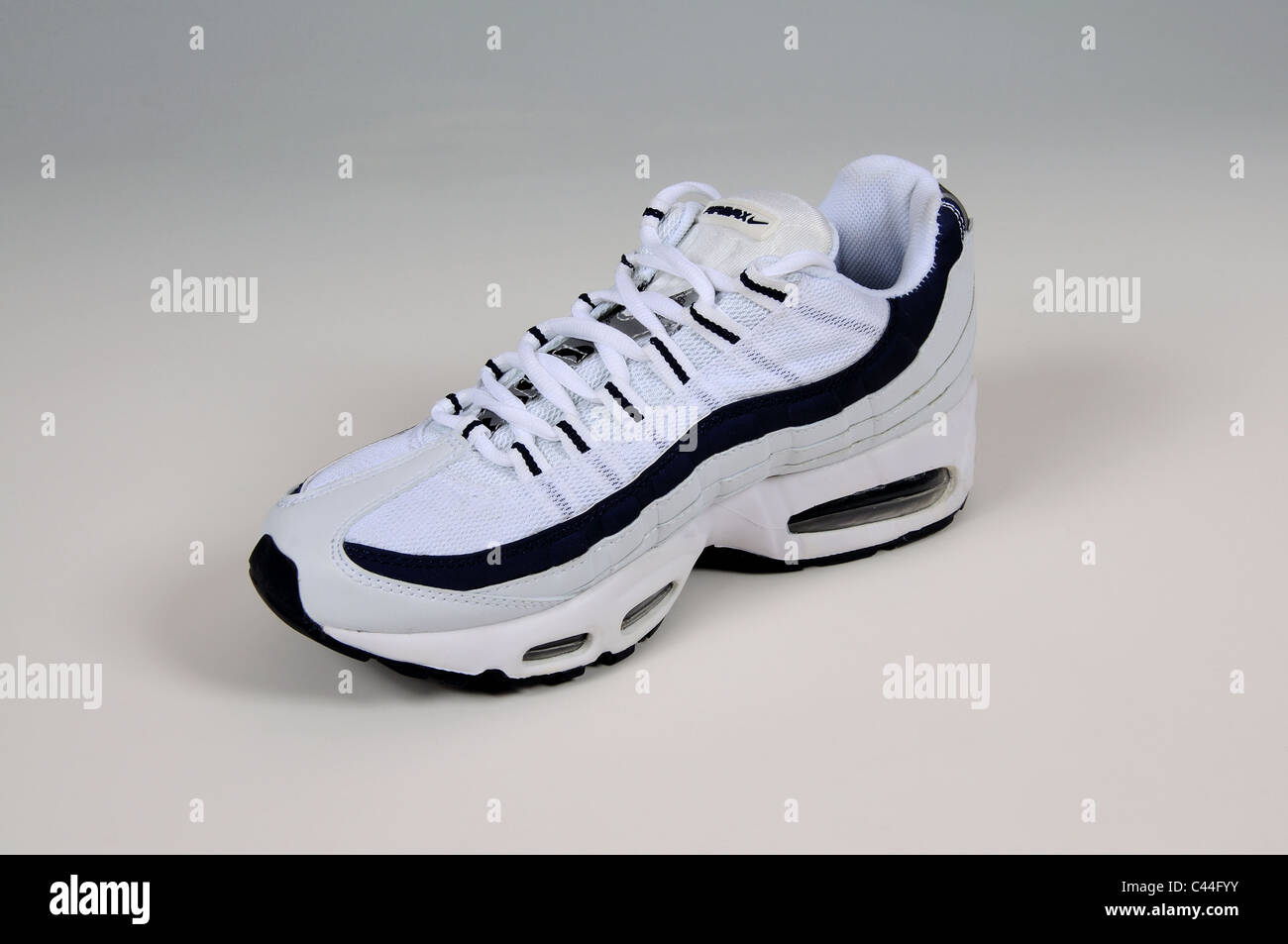 Grey nike trainers High Resolution Stock Photography and Images - Alamy