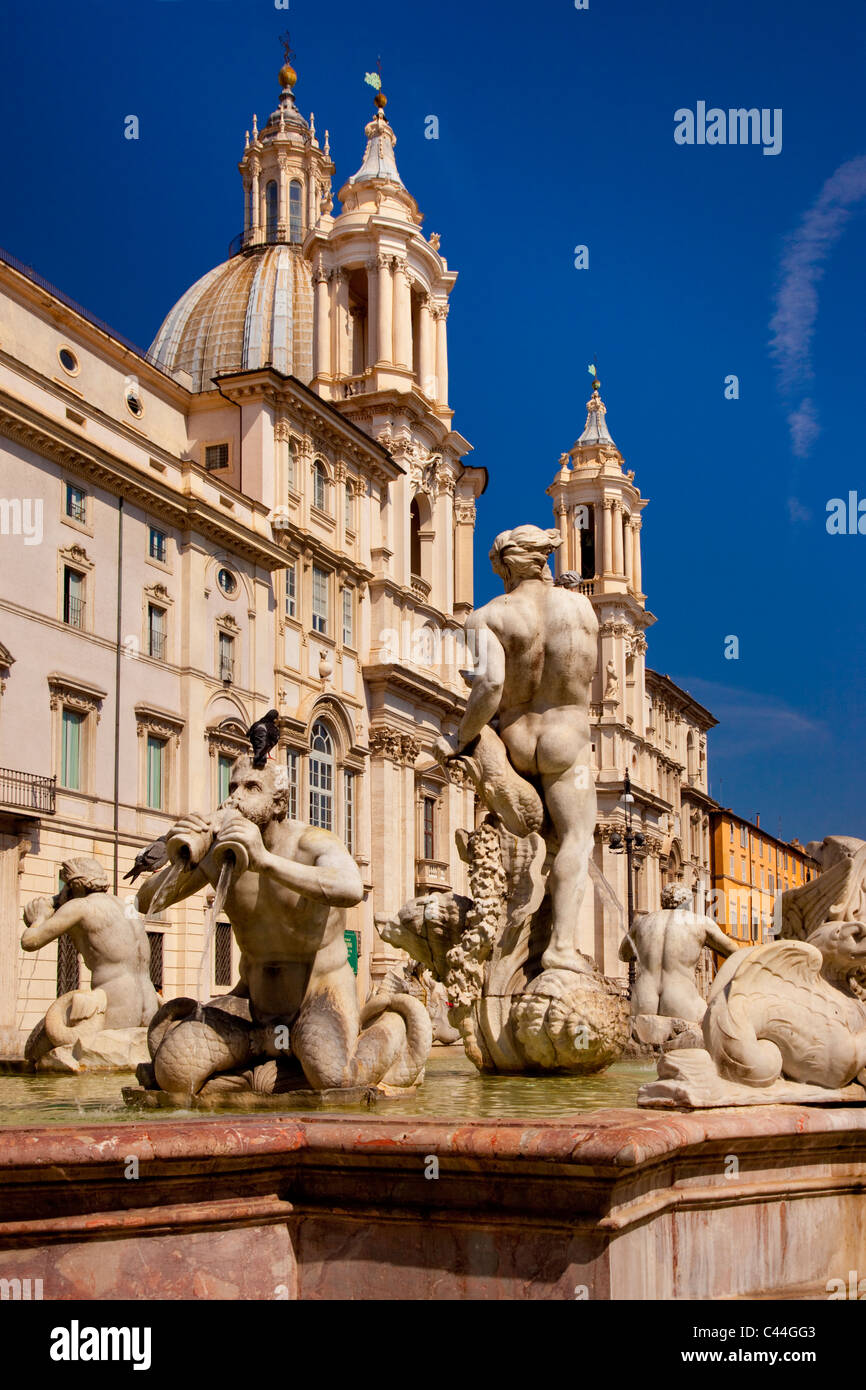 Fountain of the Moorish with Chiesa di Sant Agnese beyond in Piazza Navona, Rome Italy Stock Photo