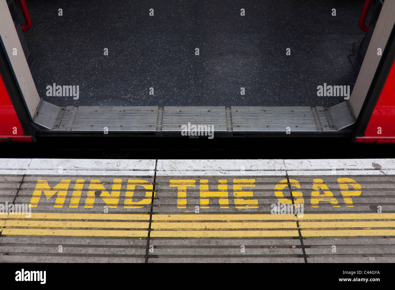 Mind the gap sign on Underground station platform on the Central Line Epping Station Stock Photo