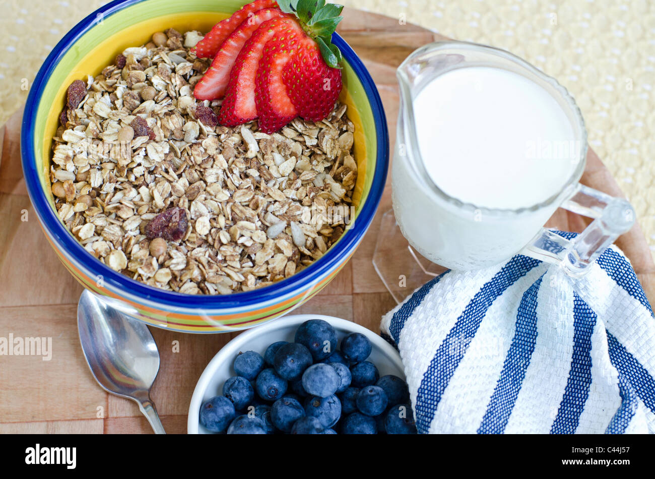 Granola cereal with fruit and milk Stock Photo Alamy