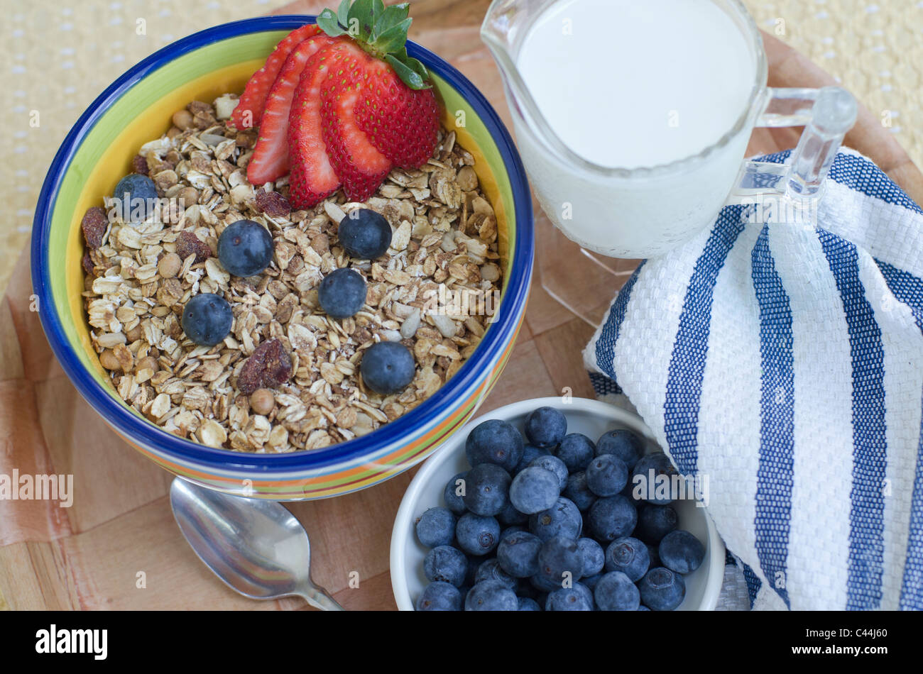 Granola cereal with fruit and milk Stock Photo Alamy