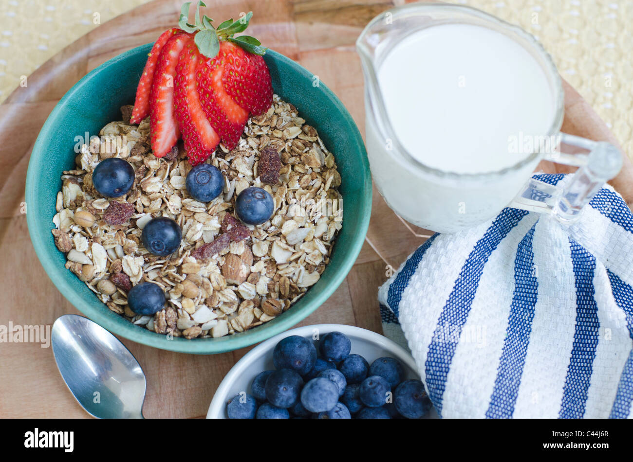 Granola cereal with fruit and milk Stock Photo Alamy