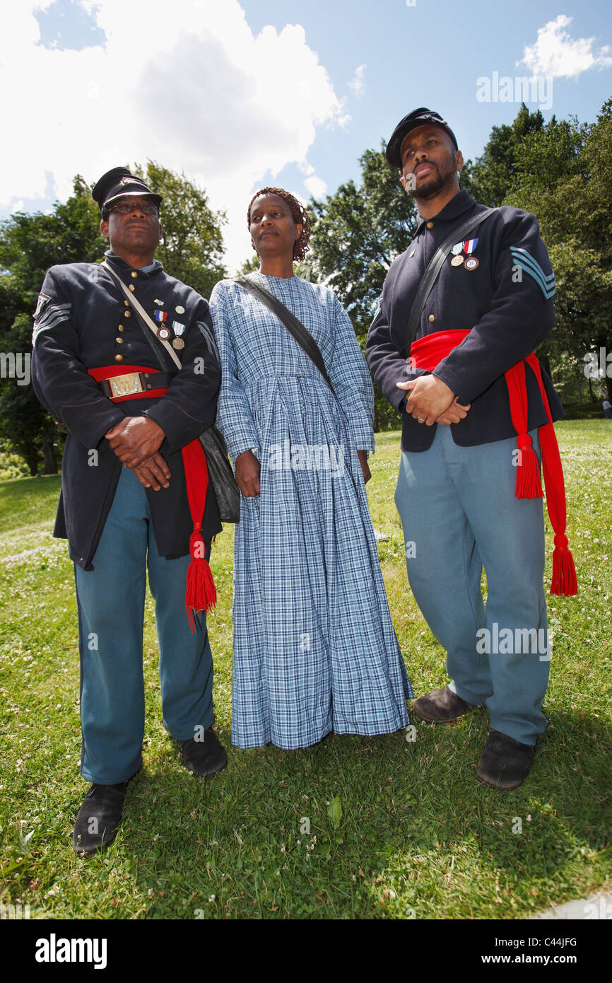 Reenactors in the uniform of the 54th Massachusetts Volunteer Infantry Regiment, an all black unit in the American Civil War Stock Photo