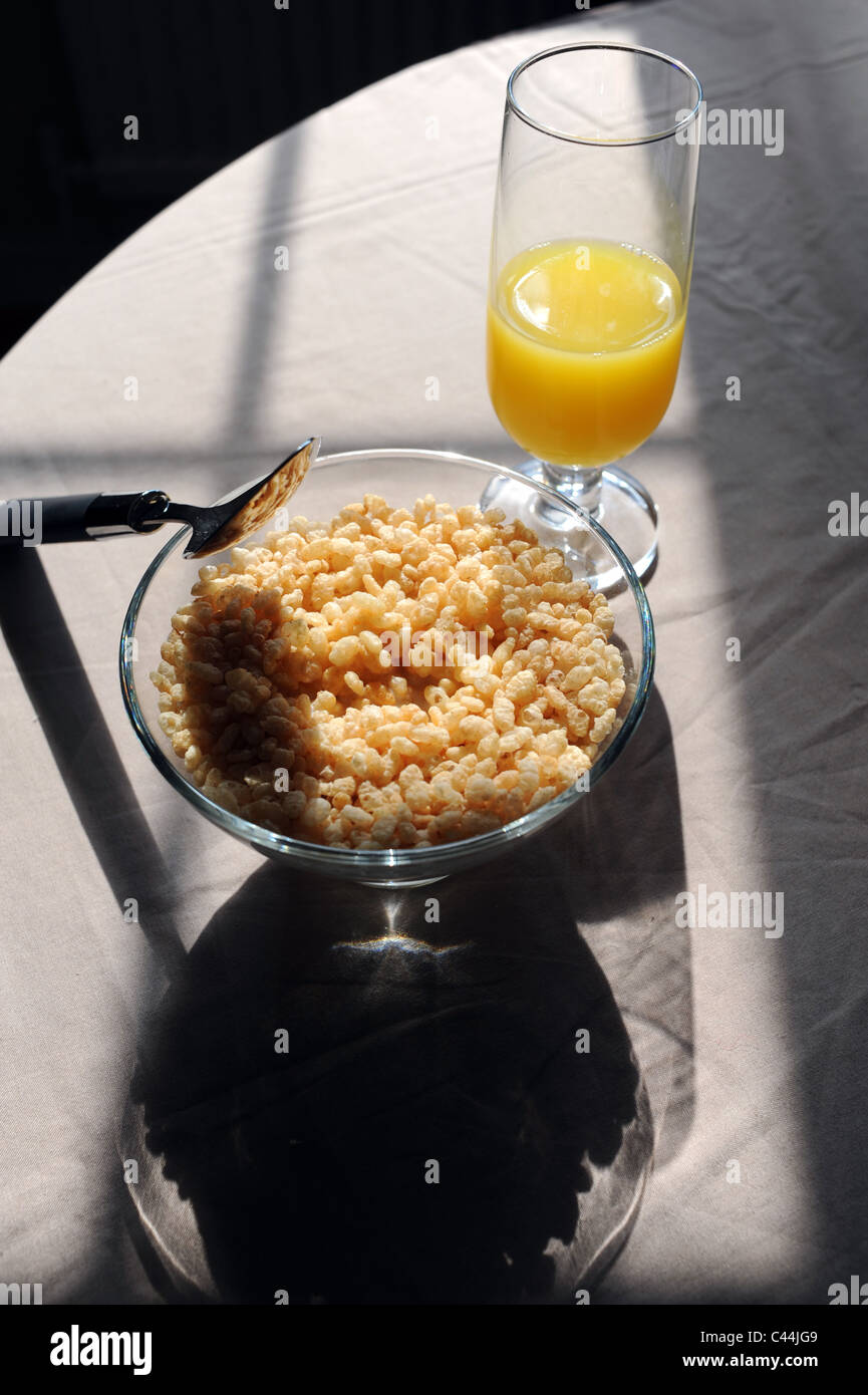 healthy morning breakfast of bowl of Rice Krispies with milk and glass
