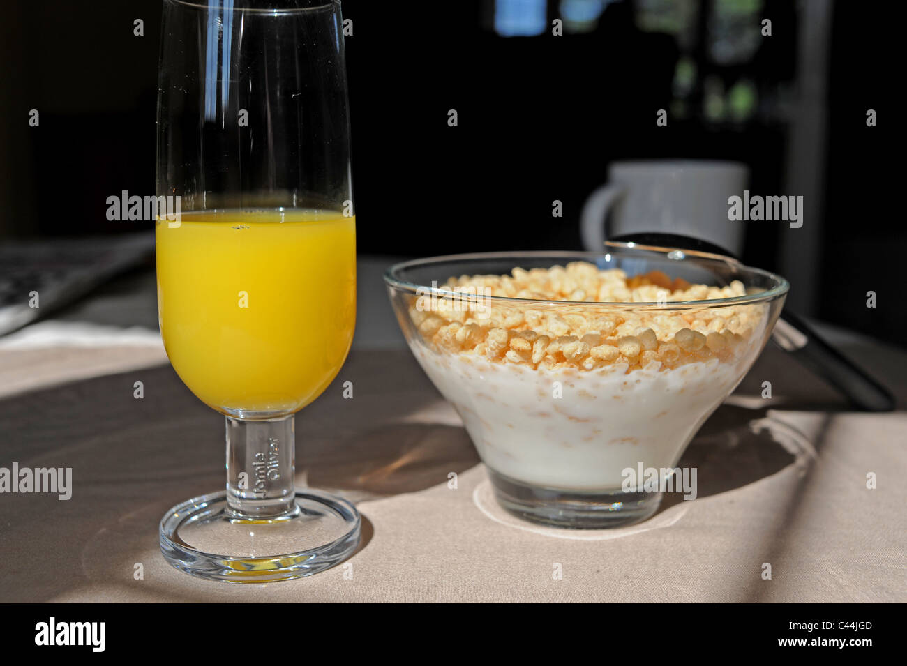 healthy morning breakfast of bowl of Rice Krispies with milk and glass