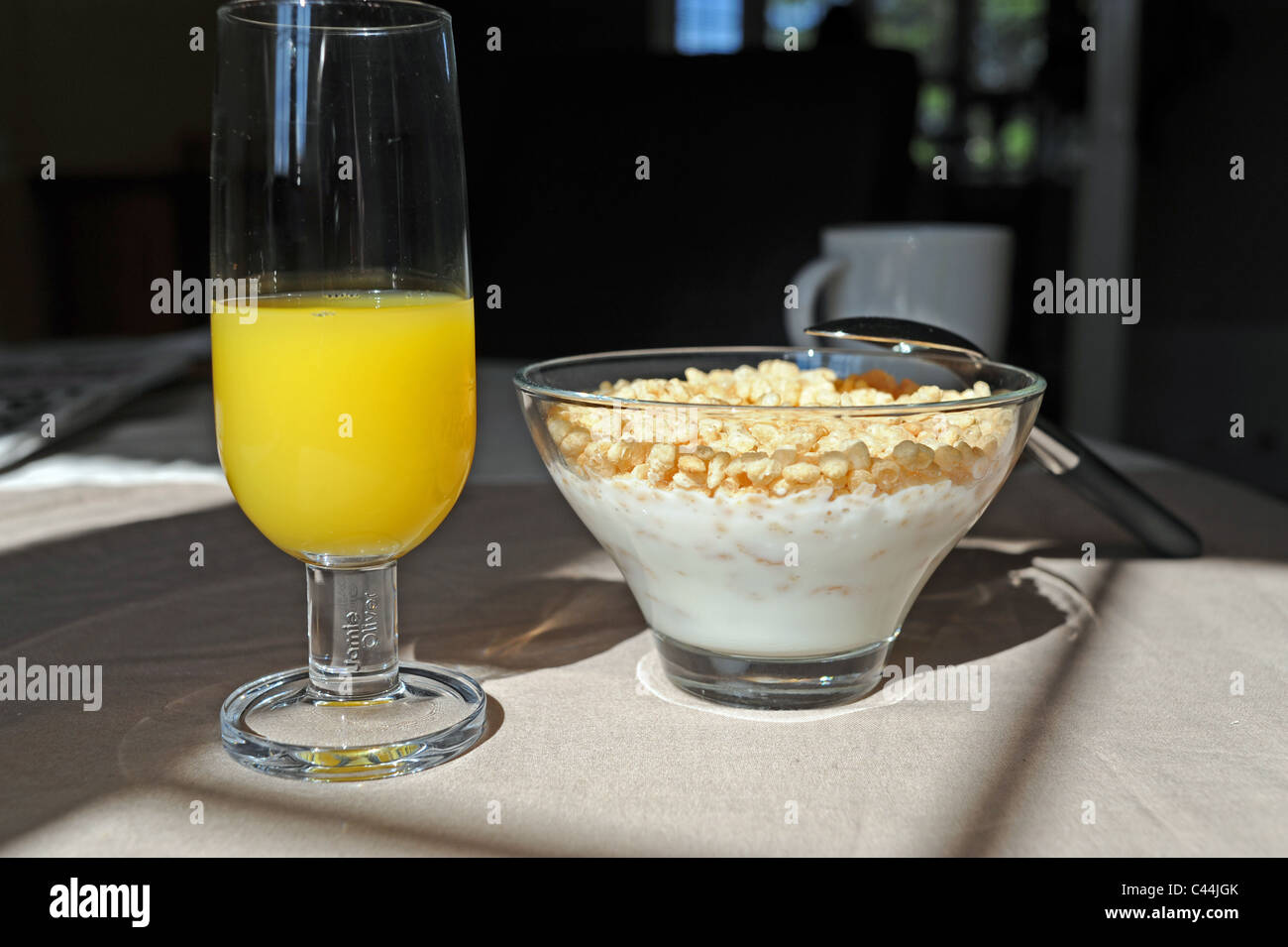 healthy morning breakfast of bowl of Rice Krispies with milk and glass