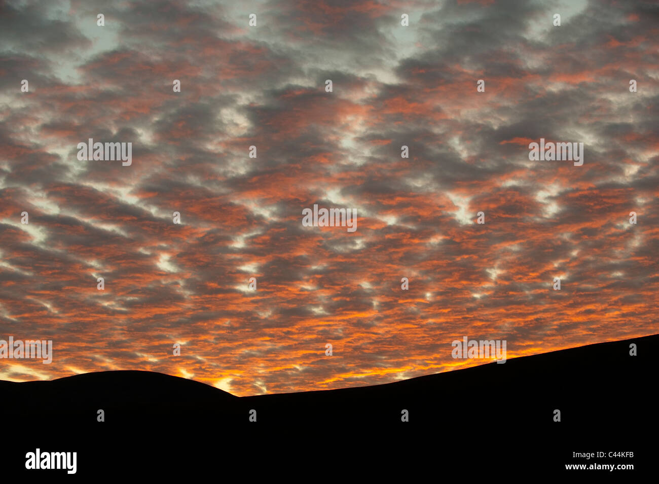 Sunset over the Howgills with mackerel sky Stock Photo