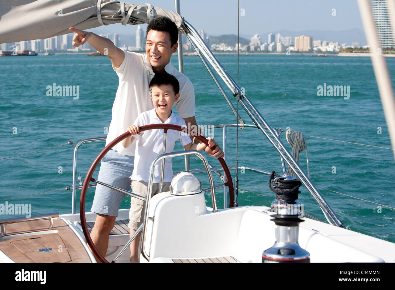 Three boys rigging hi-res stock photography and images - Alamy
