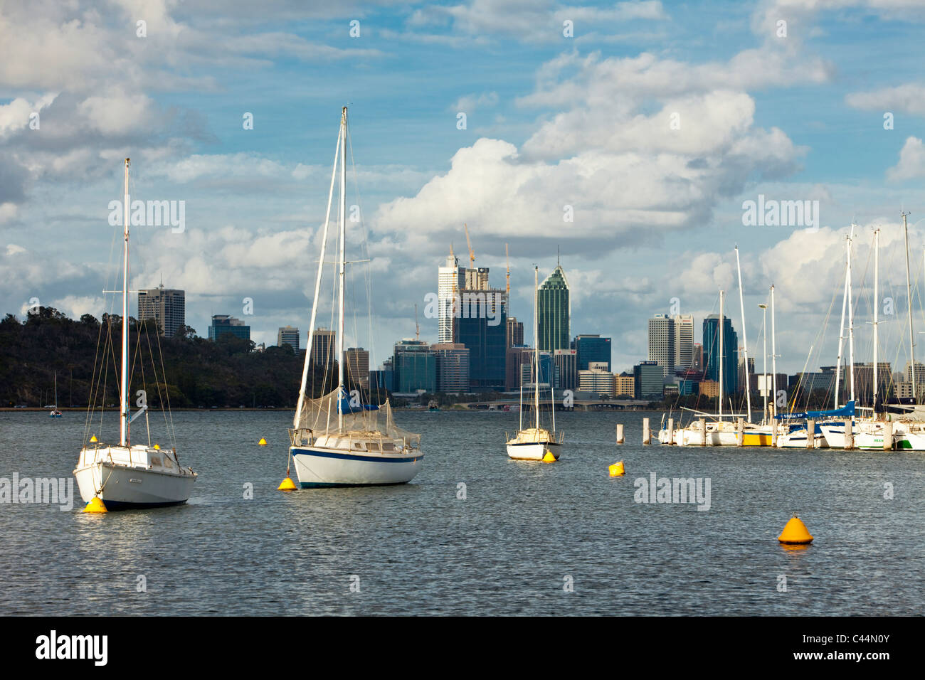Yachts in Matilda Bay with city skyline in background. Perth, Western Australia, Australia Stock Photo