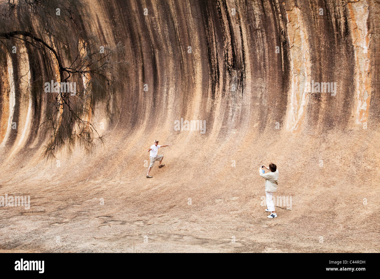 Tourists at Wave Rock - a natural rock formation near Hyden, Western ...