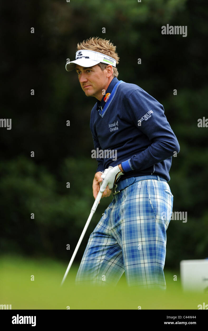 Professional Golfer In Ian Poulter plays a shot Stock Photo