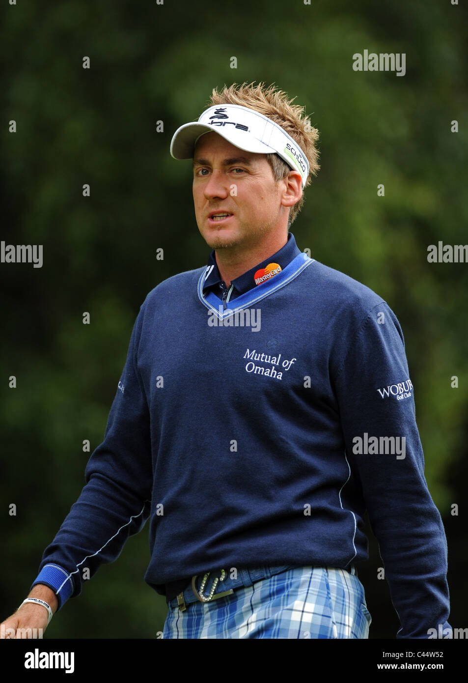Professional Golfer In Ian Poulter plays a shot Stock Photo