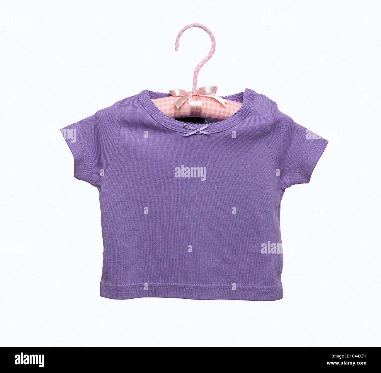 Purple t-shirt on coat hanger Stock Photo